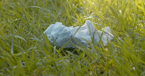 Pure virtual grass on the screen instead of real meadow with garbage Stock Footage 131978792