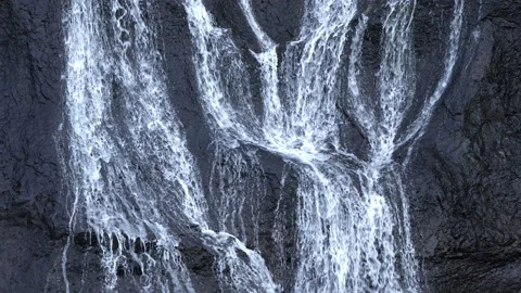 Pure water stream running through stone boulders, Wild mountain river splash 8k Stock Footage 235464260