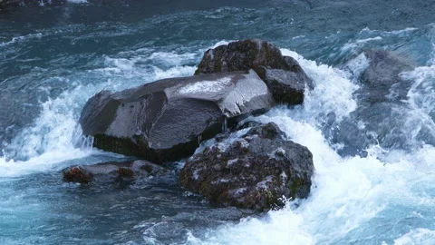 Pure water stream running through stone boulders, Wild mountain river splash 8k Stock Footage 235466431