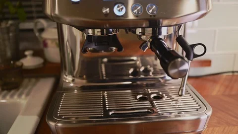 Purging a wand after brewing a coffee. Blast of steam. Video stock 125581733