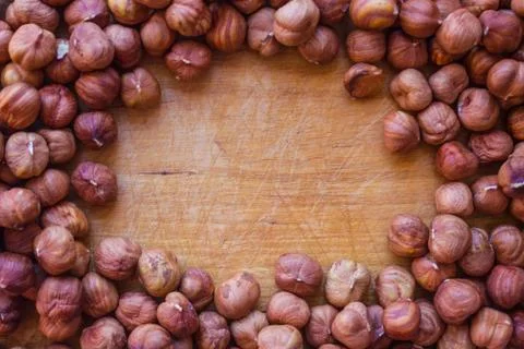 Purified hazelnuts on the table. Stock Photos