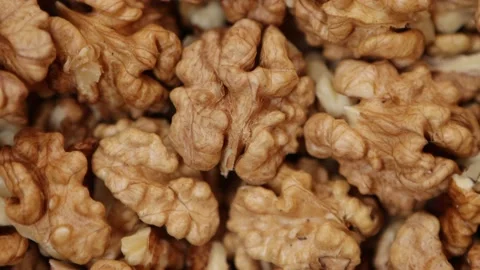 Purified Walnut close up. Nuts texture. Walnut rotation background. Stock Footage 223335068