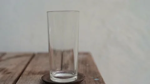 Puring milk on glass. Video stock 131026374