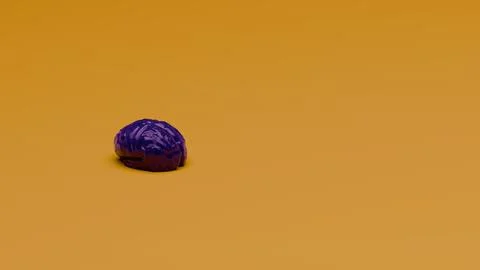 Purple 3D brain model resting on smooth yellow surface with soft shadows.. Stock Photos