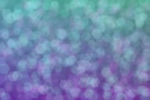 Purple and green abstract defocused background, hexagon shape bokeh pattern. Stock Photos