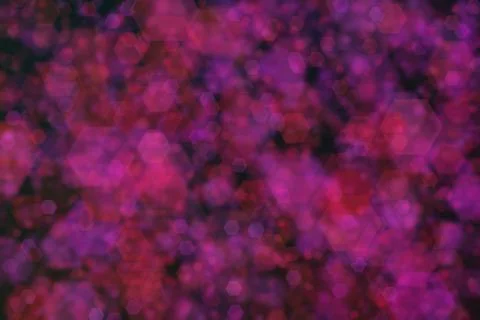 Purple and red abstract defocused background, hexagon shape bokeh pattern. 스톡 사진