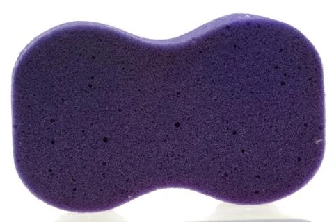 Purple bath sponge Stock Photos