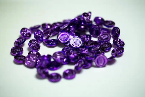 Purple beads on table Stock Photos