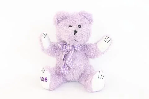 Purple bear on a white background. Stock Photos
