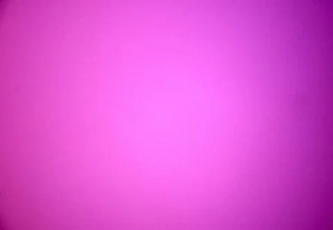 Purple blurred solid color background. Texture, gradient, vignetting, close-u Stock Photos