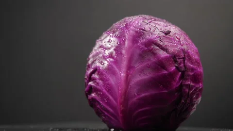 Purple cabbage on a black background in panning shot Stock-Footage 134456566