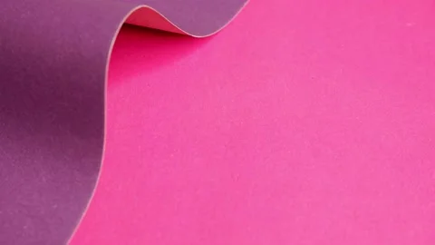Purple cardboard on a pink background. The texture of the cardboard. Stock Footage 158103671