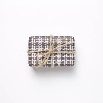 Purple check pattern gift box isolated on white background Purple check pa... Stock Photos