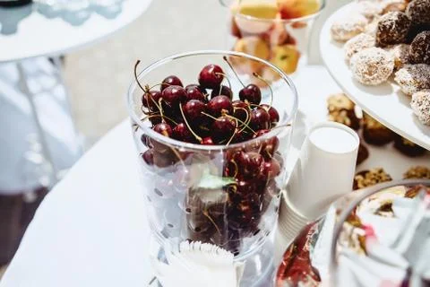 Purple cherries on a buffet table Stock Photos