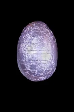 Purple chocolate easter egg Stock Photos