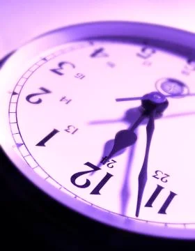 PURPLE CLOCK FACE Stock Photos