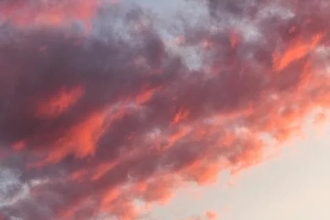 Purple clouds at sunset Stockfoto's