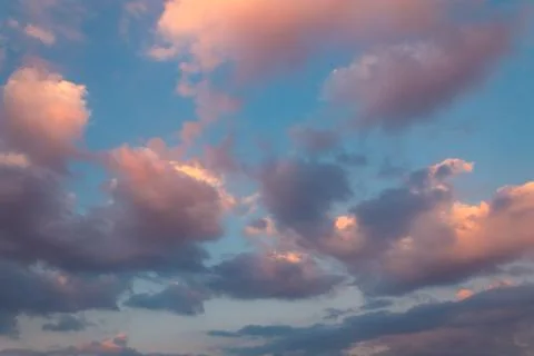 Purple clouds sunset with the sky in background. Stock Photos