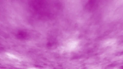 Purple clouds swirl softly across the sky Stock Footage 345434376