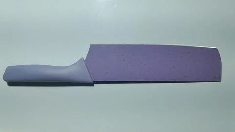Purple colored sharp knife Stock Photos