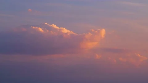 Purple colorful sunset. The clouds are illuminated in red from the sunset 스톡 동영상 212437774
