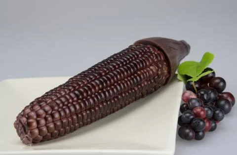 Purple corn in plate Stock Photos