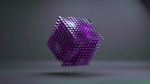 A purple cube made of many cubes pulsating and changing shape in a 3D animati Stock Footage 253620320