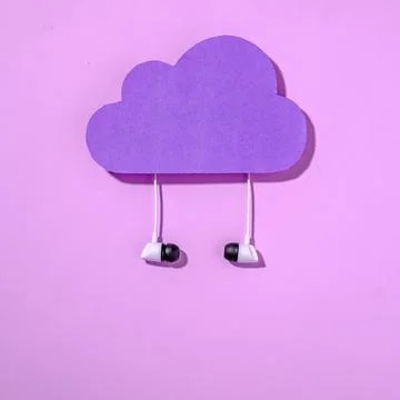 Purple data storage cloud and headphones concept technology concept. Stock Photos