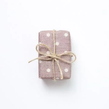 Purple dot pattern gift box isolated on white background 写真素材