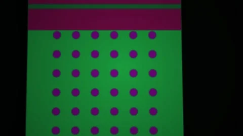 Purple dots on green background pattern. Stock Footage 340040438