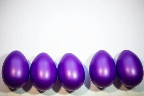 Purple easter eggs on white background Stock Photos