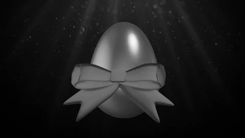 Purple egg with camouflage pattern and red bow Loop Stock Footage 308019939