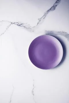 Purple empty plate on marble table background, tableware decor for breakfast, Stock Photos