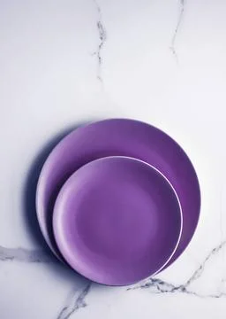 Purple empty plate on marble table background, tableware decor for breakfa... Stock Photos