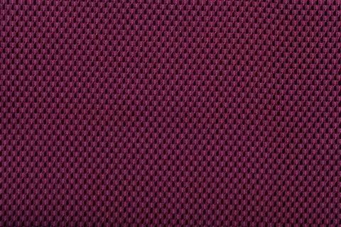 Purple fabric with abstract pattern. red fiber texture polyester close-up Stock Photos