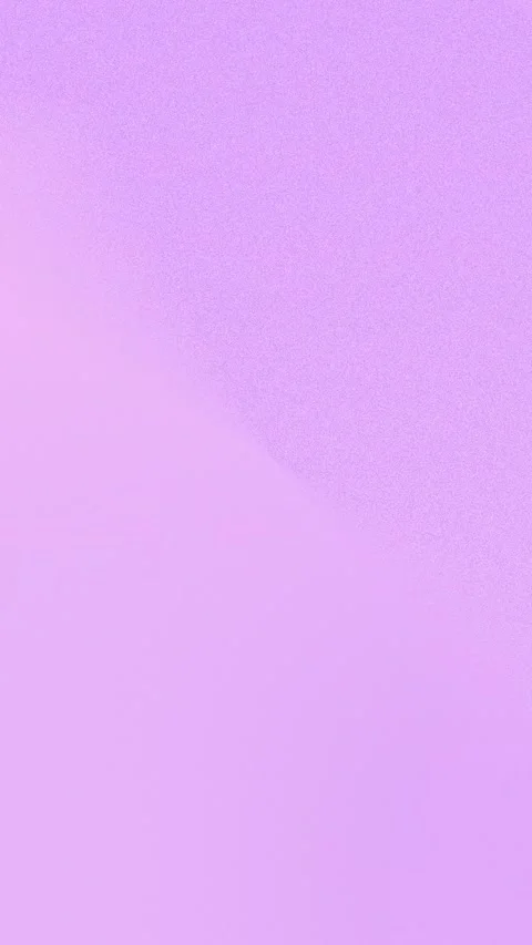 Purple gradient with fine grain texture, creating a seamless loop background. Stock Footage 309956522