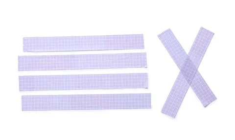 Purple grid patterned washi tape strips and cross shape isolated on white bac Stock Photos