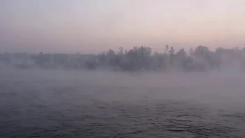 Purple haze over the river at sunset in winter 11 Stock Footage 83745522