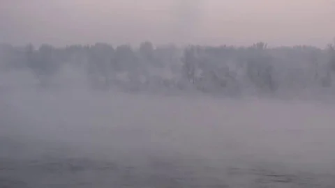 Purple haze over the river at sunset in winter 10 Stock Footage 83745525