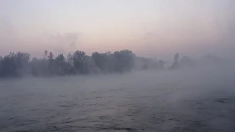 Purple haze over the river at sunset in winter 06 Stock Footage 83745546