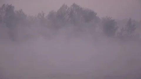 Purple haze over the river at sunset in winter 05 Stock Footage 83745562