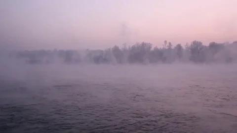Purple haze over the river at sunset in winter 02 Stock Footage 83745626