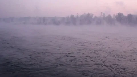 Purple haze over the river at sunset in winter. Stock Footage 83745654