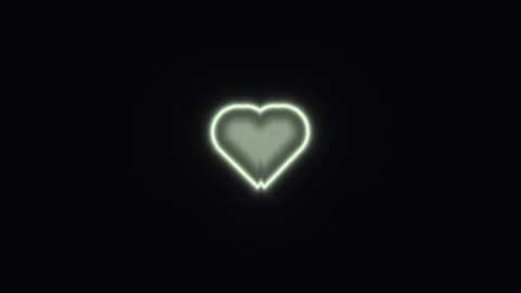 Purple heart shape glowing on dark background Stock Footage 338180757