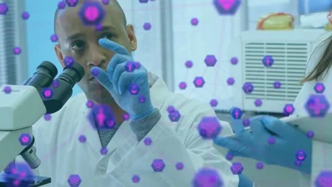 Purple hex overlay appearing, man at lab microscope pointing at it while tech Stock Footage 321783020