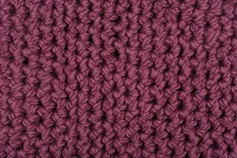 Purple knitted texture close up Stock Photos