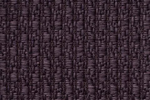 Purple knitted woolen background with pattern of fleecy cloth. Texture textil 스톡 사진