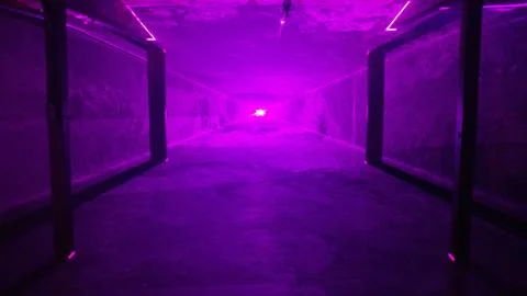 Purple laser light tunnel in empty night club/music festival, alpha matte Stock Photos
