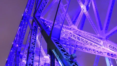 Purple light on bridge during winter Stockbeeldmateriaal 125552420