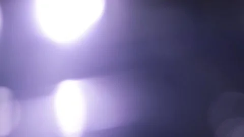 Purple light leak and soft bokeh flare transitions with film grain Stock Footage 340453736